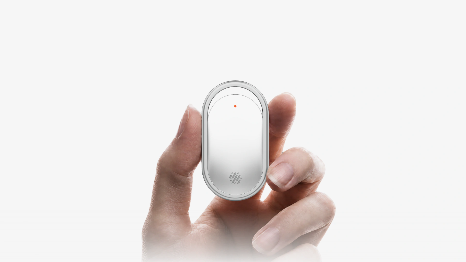 Hand holding the nuva wearable perfume device
