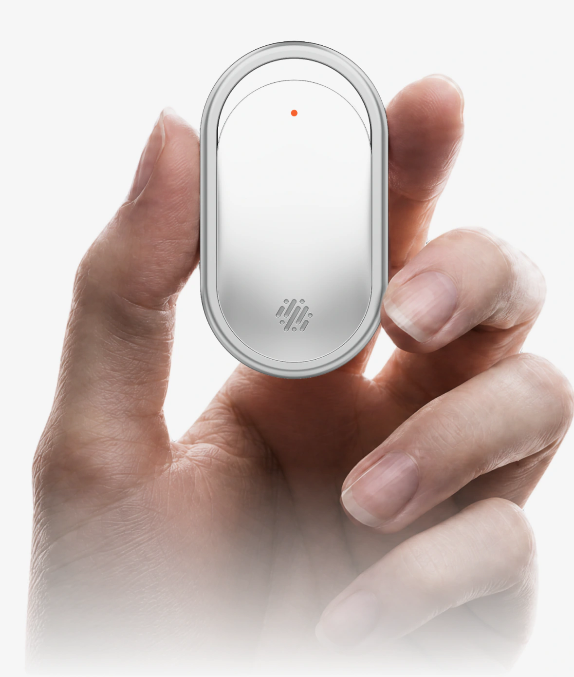 Hand holding the nuva wearable perfume device